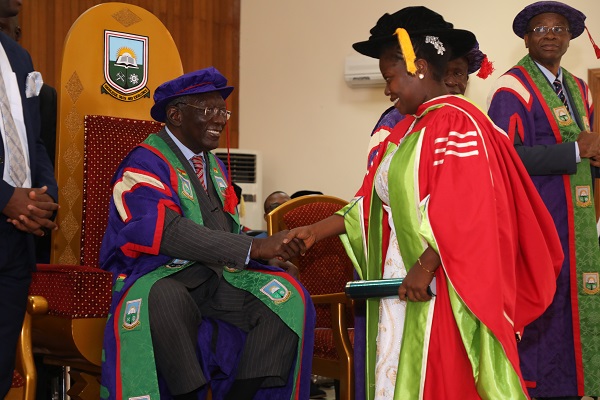Dr Mrs Etornam Bani Fiadonu the only Female PhD Graduand Being Congratulated by President Kuffuor