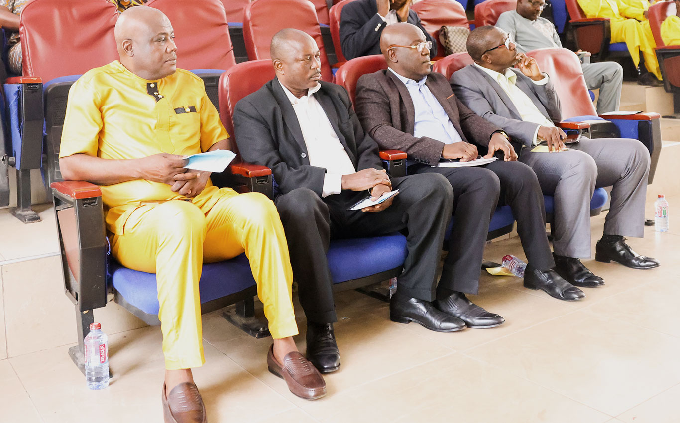 Vice Chancellor (3rd from left) flanked by members of Management